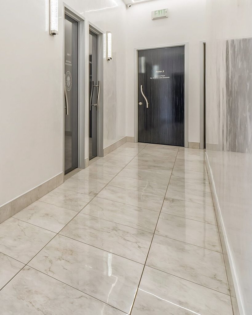 Italian marble hallway with decorative lighting