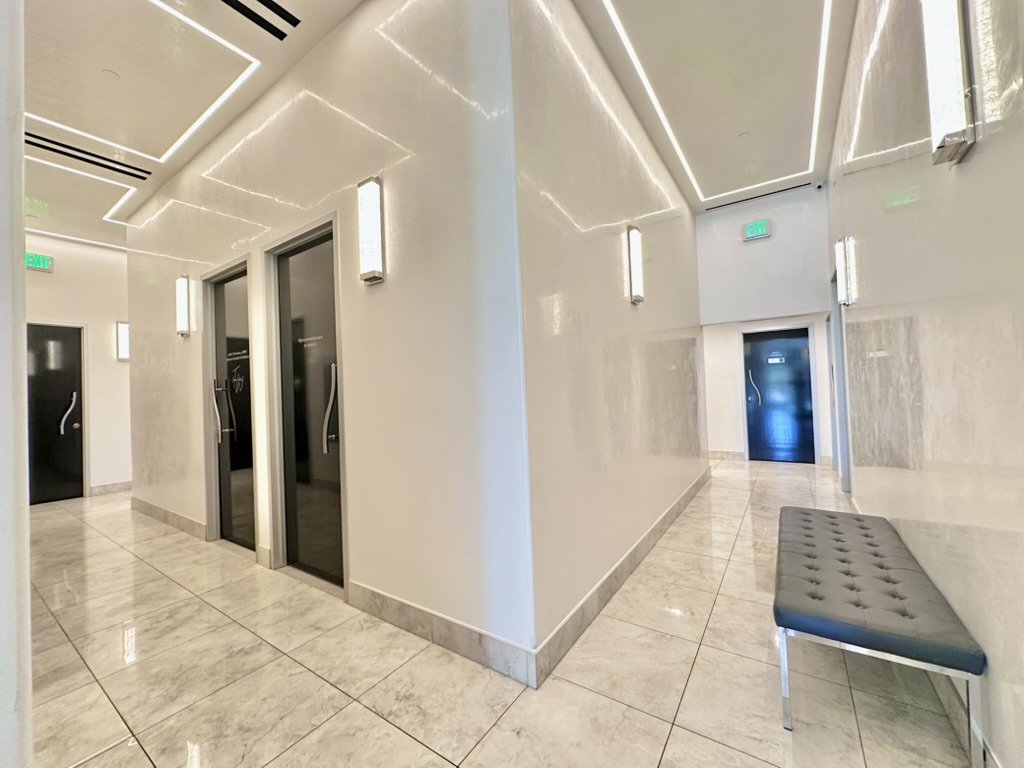 Elevated ceilings with overhead lighting