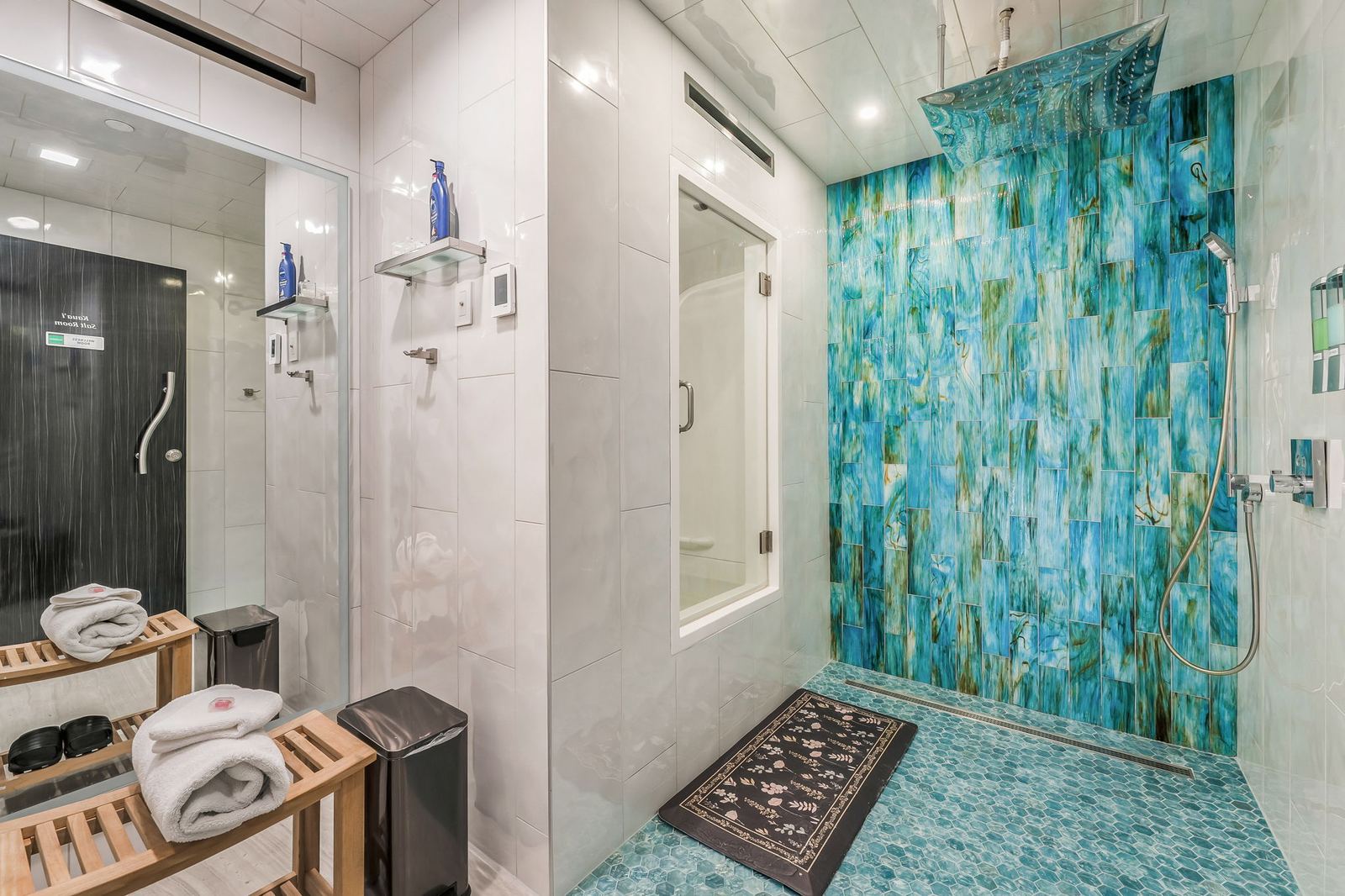 Kaua'i salt room with colorful glass-tile shower